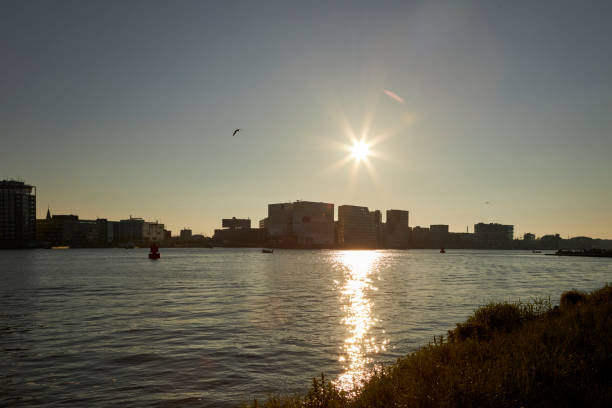 istock Amsterdam The river IJ skyline at sunset 1398979305