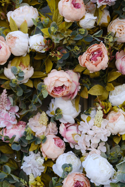 istock Background from artificial colorful flowers and leaves 1398979475