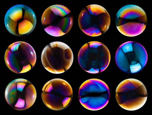 istock Soap bubbles isolated on black background . 1398980626