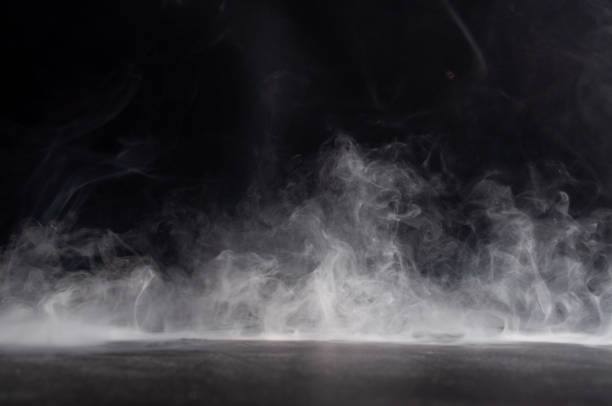 istock Abstract smoke on a dark background . 1398980783