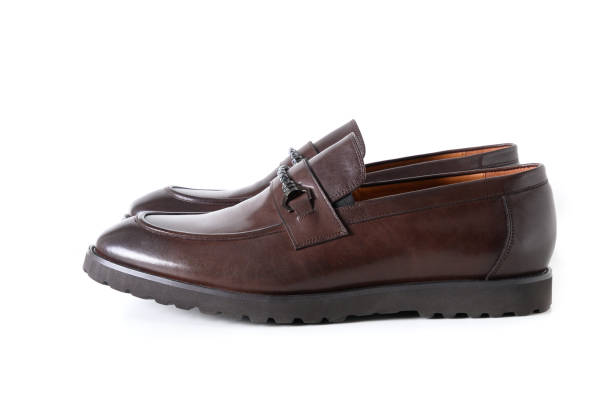 istock Male brown leather shoes isolated on white background. 1398980973