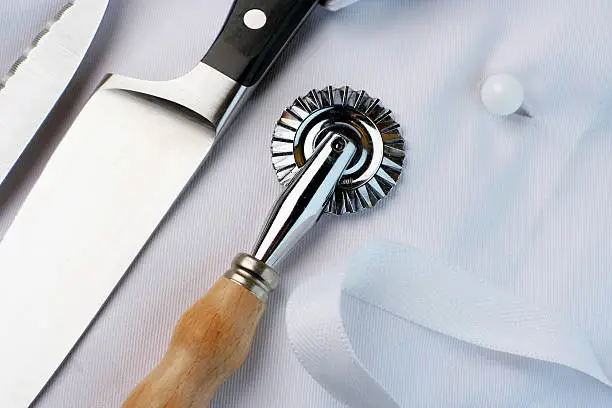 Chef's uniform and tools of trade. Suitable image for training, education and cooking school.