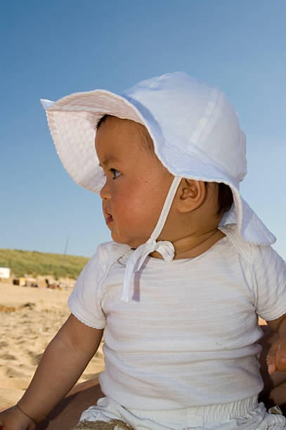 baby girl with hat stock photo