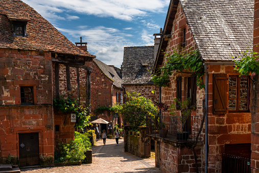 Collonges-la-Rouge, France - 13 May, 2022: view of the historic red sandstone town of Collonges-la-Rouge