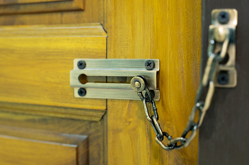 Door lock, chain lock on wooden door