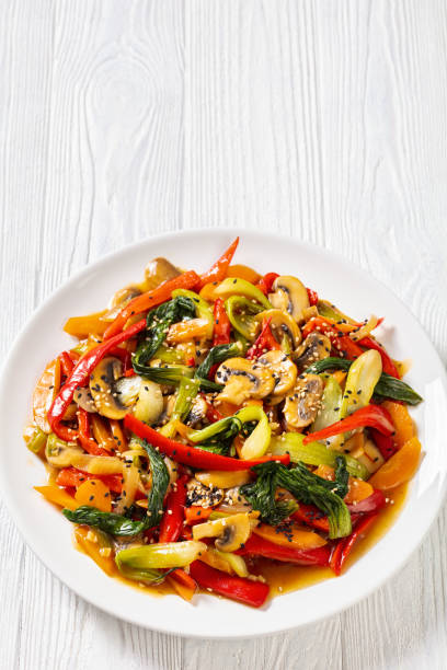 istock Stir Fry Vegetables on white plate, top view 1398988462