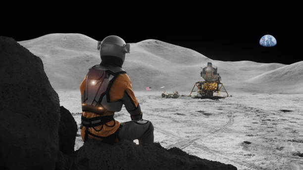 istock Astronaut stranded on the moon missing home. Distant planet Earth in the sky 1398989834