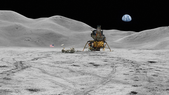 Moon base in a zero gravity environment. Space program mission outpost. Lunar outpost in a colorless terrain of sand and rocks with footprints on the ground. Apollo Mission inspired. NASA Public Domain Imagery