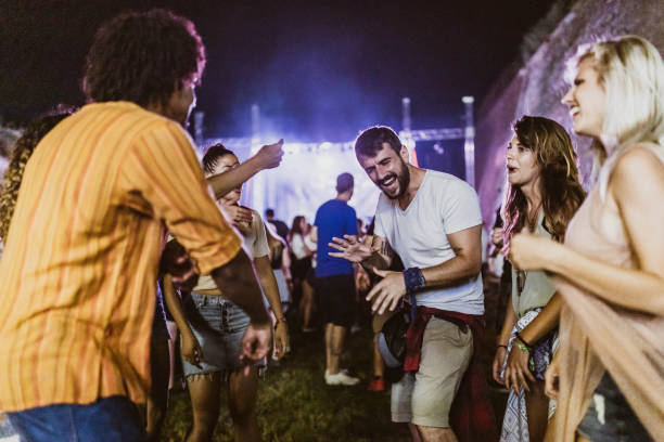 istock Dancing on music festival by night! 1398990933