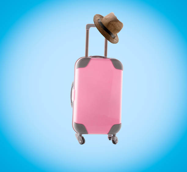 istock Pink suitcase and hat on blue background. Vignette. Summer minimal creative art poster. 1398993349