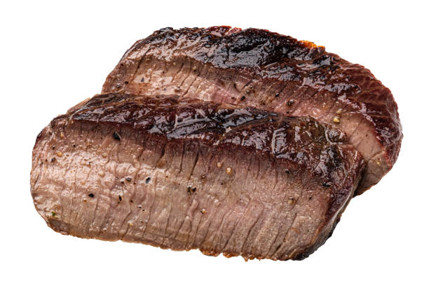 istock Grilled beef slices isolated on white background 1398994404