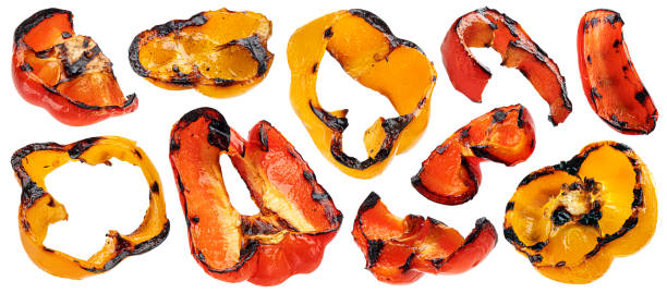istock Grilled paprika slices isolated on white background 1398994964