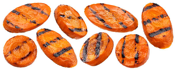 istock Grilled carrot isolated on white background 1398994976