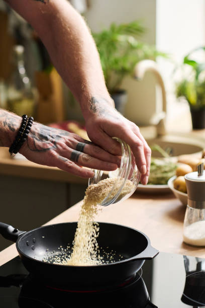 Man Frying Sesame Seeds