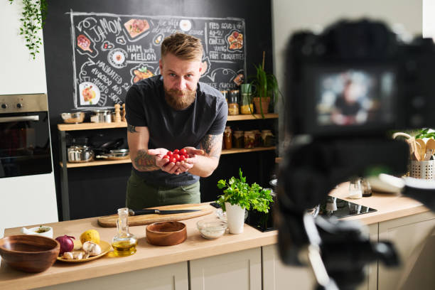 istock Food Blogger Showing Cherry Tomatoes 1398998717