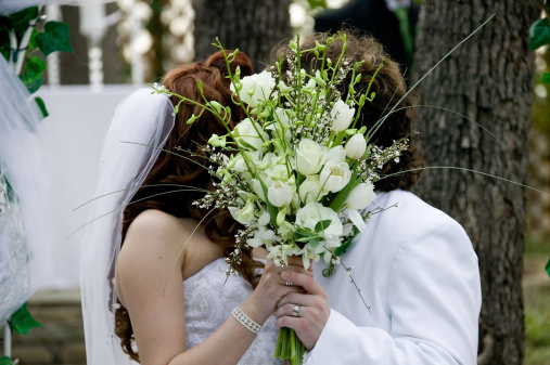 wedding couples first kiss