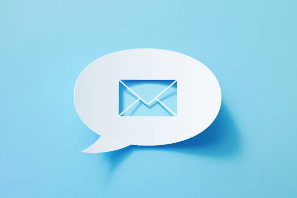 istock Circular White Chat Bubble With Cut Out Mail Symbol Sitting On Blue Background 1398999583