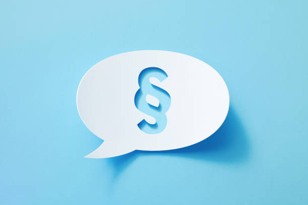 Circular White Chat Bubble With Cut Out Justice Symbol Sitting On Blue Background Circular white chat bubble with cut out justice symbol sitting on blue background. Horizontal composition with copy space. paragraph stock pictures, royalty-free photos & images