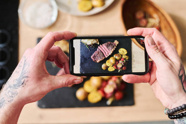 Taking Picture Of Steak With Side Dish