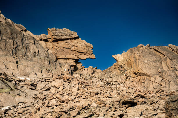 istock Blue Sky Through the Keyhole on the route to Longs Peak 1399004588