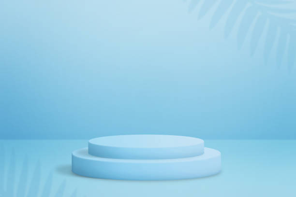 istock Double cylinder shape podium for product presentation. Clean scene with blue background and small shadows of palm leaves 1399004654