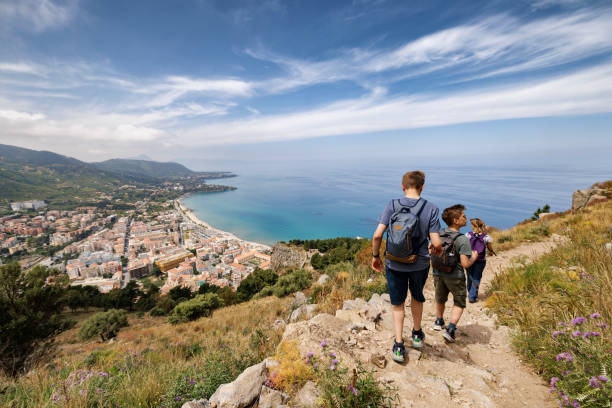Family hiking in Sicily on a spring day.