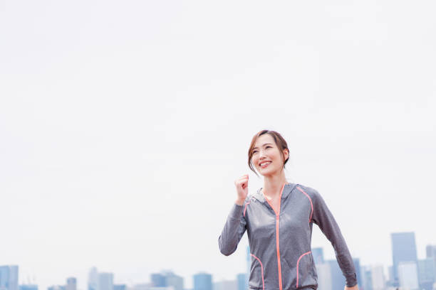 istock Young woman enjoying training outdoors 1399005251