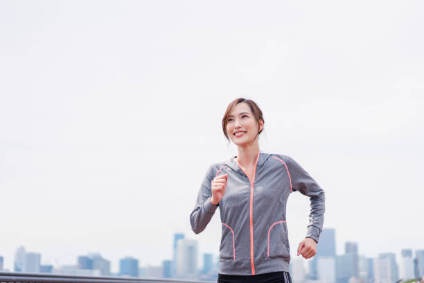 istock Young woman enjoying training outdoors 1399005268