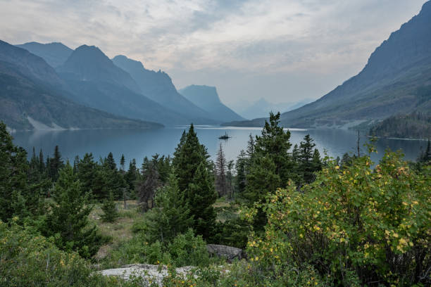istock Forest Fire Smoke Obscures The Mountains Surrounding Wild Goose Island 1399005461