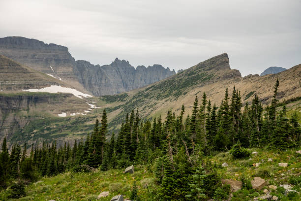 istock Piegan Pass Sits In The Saddle Between Pollock Mountain and Cataract Mountain 1399006204