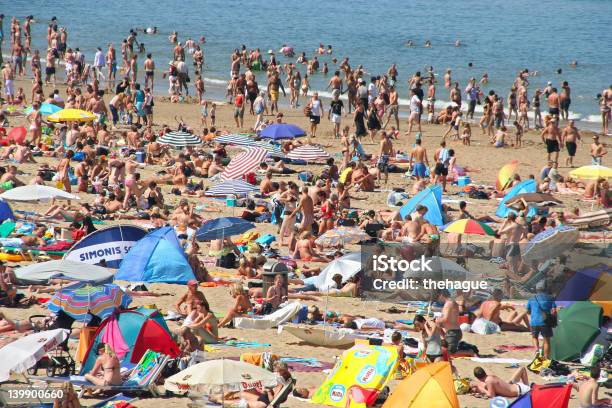 Crowded Beach Stock Photo - Download Image Now - Beach, Beach Holiday, Crowd of People