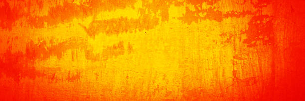 istock Yellow orange red grunge texture. Toned rough wall surface. Vintage background with space for design. 1399009546