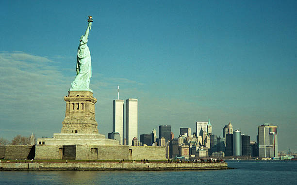 Lady Liberty and Twin Towers Statue of Liberty and NYC World Trade Center Skyscrapers before 9/11 twin towers manhattan stock pictures, royalty-free photos & images