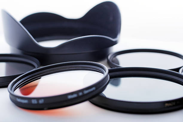 Photo filters and lens hood stock photo