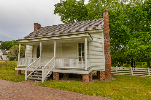 Raleigh, North Carolina, USA -May 1, 2022: Tenant house built in 1870 at Oak View Park.