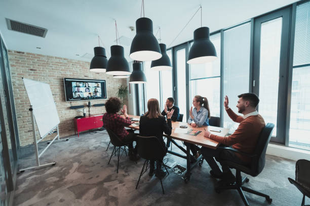 istock Successful team. Group of young multi-ethnic business people working and communicating together in creative office. Selective focus 1399013798