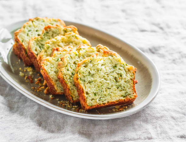 istock Savory zucchini, herbs, cheese snack cake on a light background, top view 1399016616