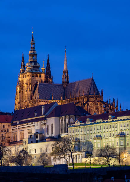 night view of Prague's Prague castle and cathedral night view of Prague's Prague castle and cathedral hradcany castle stock pictures, royalty-free photos & images