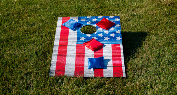 American Flag cornhole game with red and blue bean bags stock photo