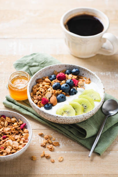 istock Granola bowl with greek yogurt, blueberries and kiwi 1399023556