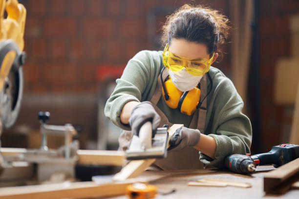 istock woman carpenter in workshop 1399023590