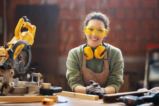 istock woman carpenter in workshop 1399023605