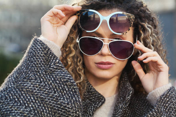 istock Young woman wearing sunglasses 1399025124