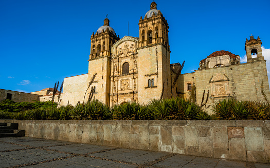 A photograph of the temple and former Convent of Santo Domingo de Guzmán of the Dominican order in Oaxaca de Juárez, Mexico, is an example of New Spain's baroque architecture.