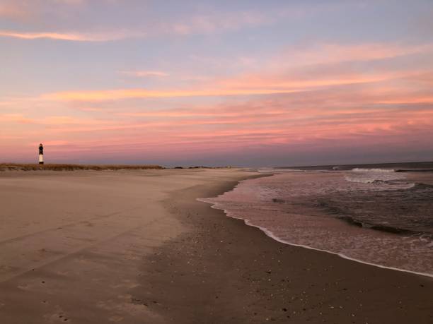 istock Pink Skies - New York Sunset - Lighthouse 1399030570