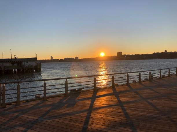 istock Sunset from a NYC Pier - Best Sunset Watching Spot in NYC 1399030721