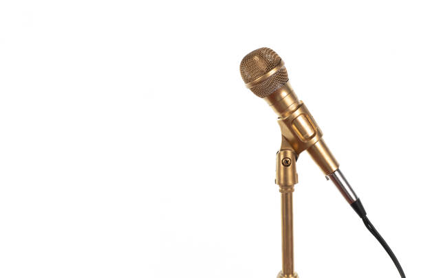 istock golden microphone isolated on white background 1399030925