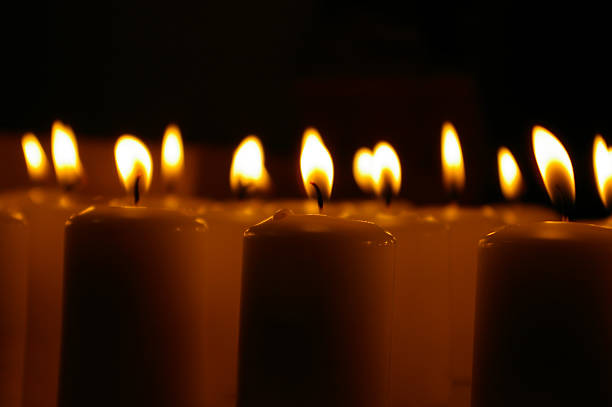 row of candles stock photo