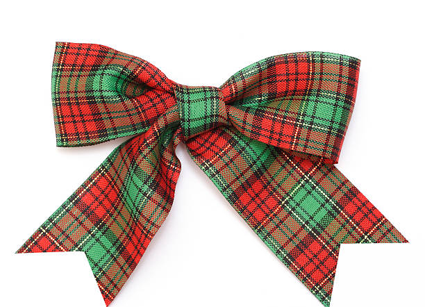 Bowknot with Christmas themed fabric in green & red pattern Bowknot bow tie stock pictures, royalty-free photos & images