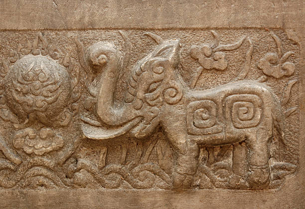 carving - oriental elephant stock photo